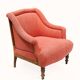 Napoleon III salon armchair in brick red linen with a tufted footrest.