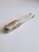 Art Nouveau sugar tongs in solid silver and vermeil