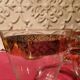 1930s footed glass service with gilding, including champagne flutes.