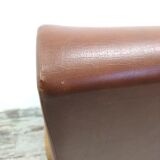 Vintage armchair in wood and imitation leather