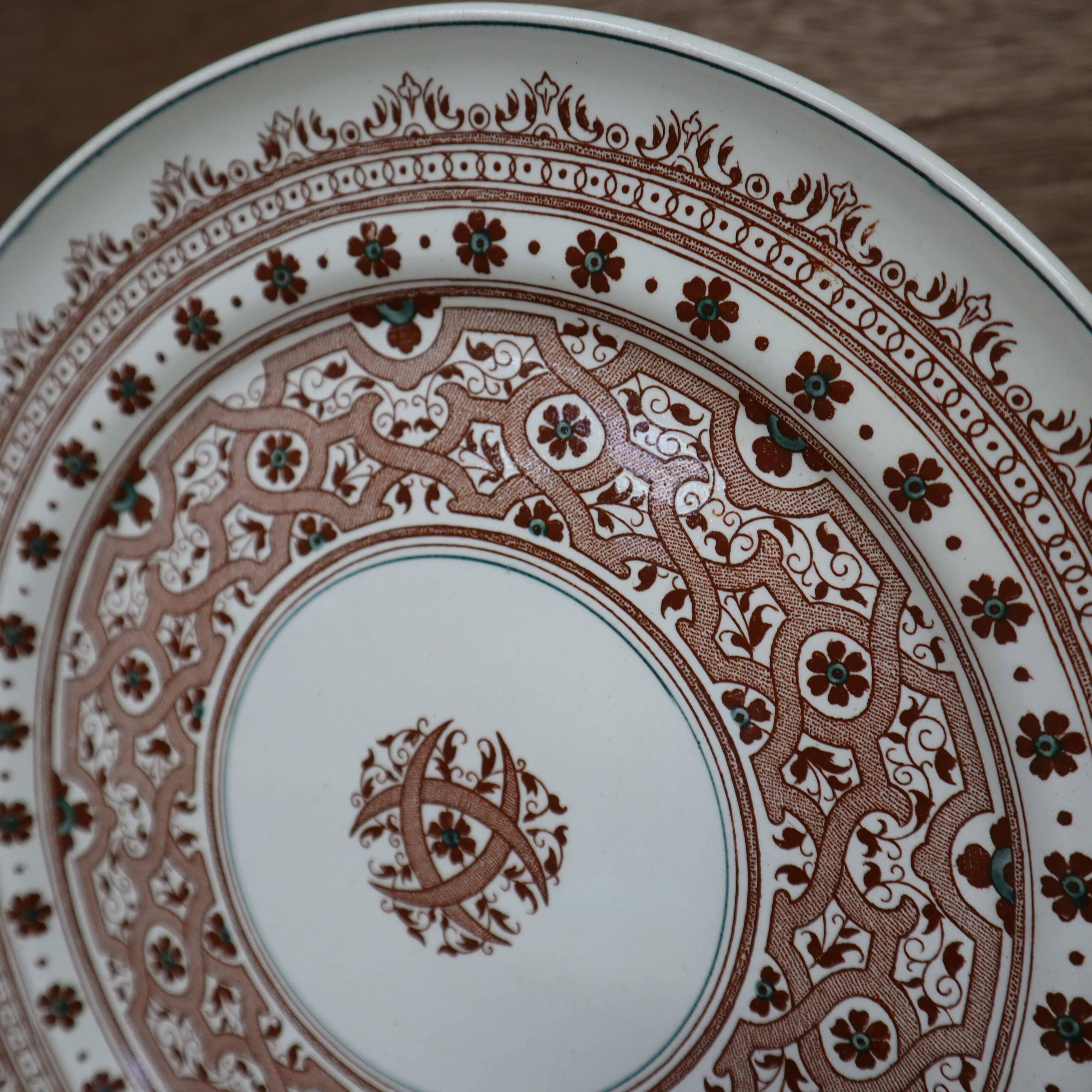 Old 26cm dish in Terre de Fer earthenware from Longwy, Henri II model