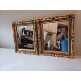 Pair of wood and gilded stucco mirrors