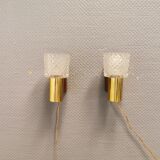 Two smaller wall lamps, made of crystal, rosewood hanging with brass colored details