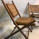 Former colonial armchairs in braided leather