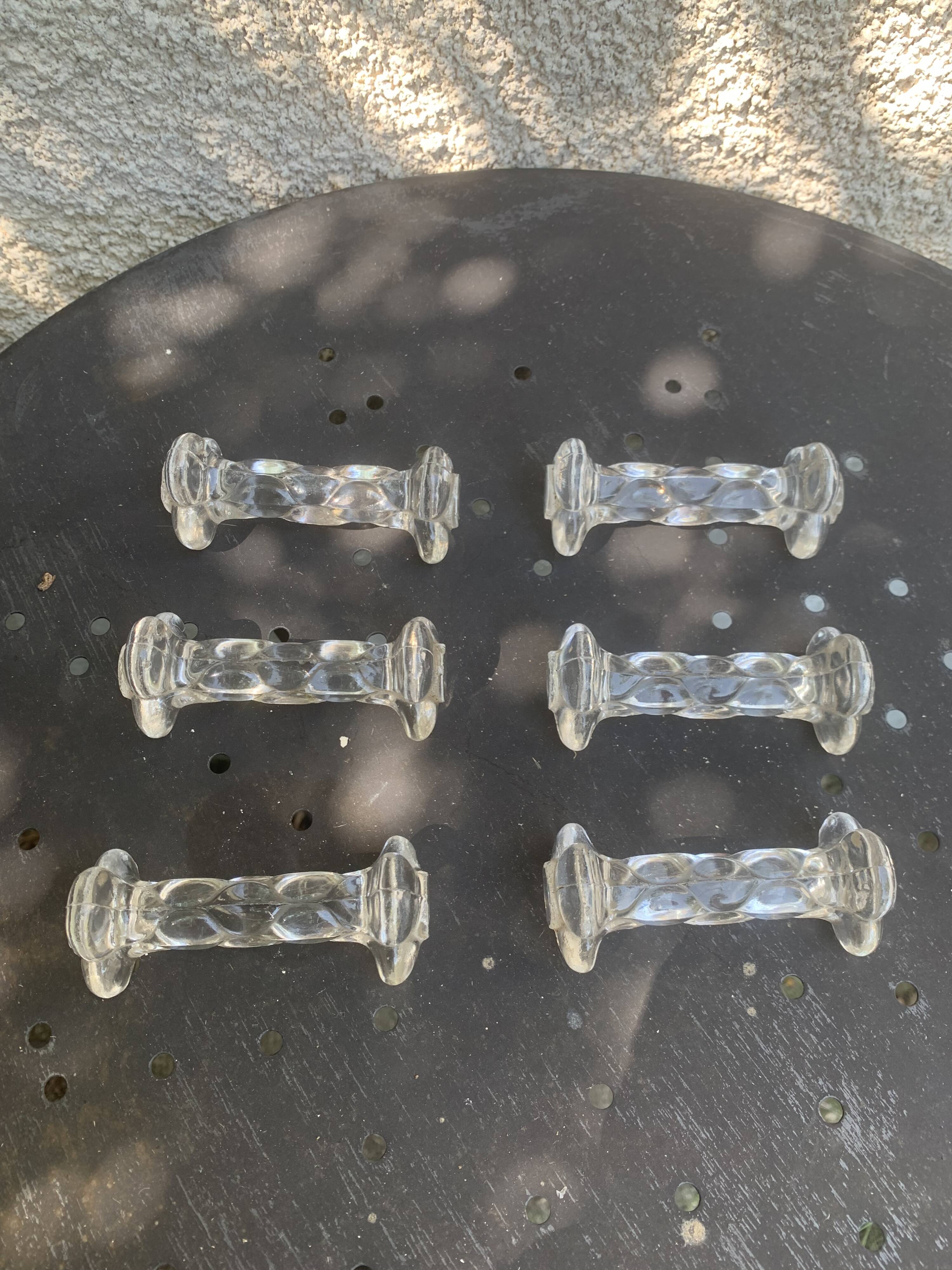 6 transparent glass knife holders, flower shape, antique twists