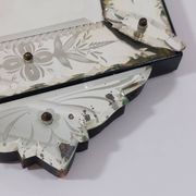 Venetian wall mirror in Murano glass with faceted floral decoration from the 1930s.