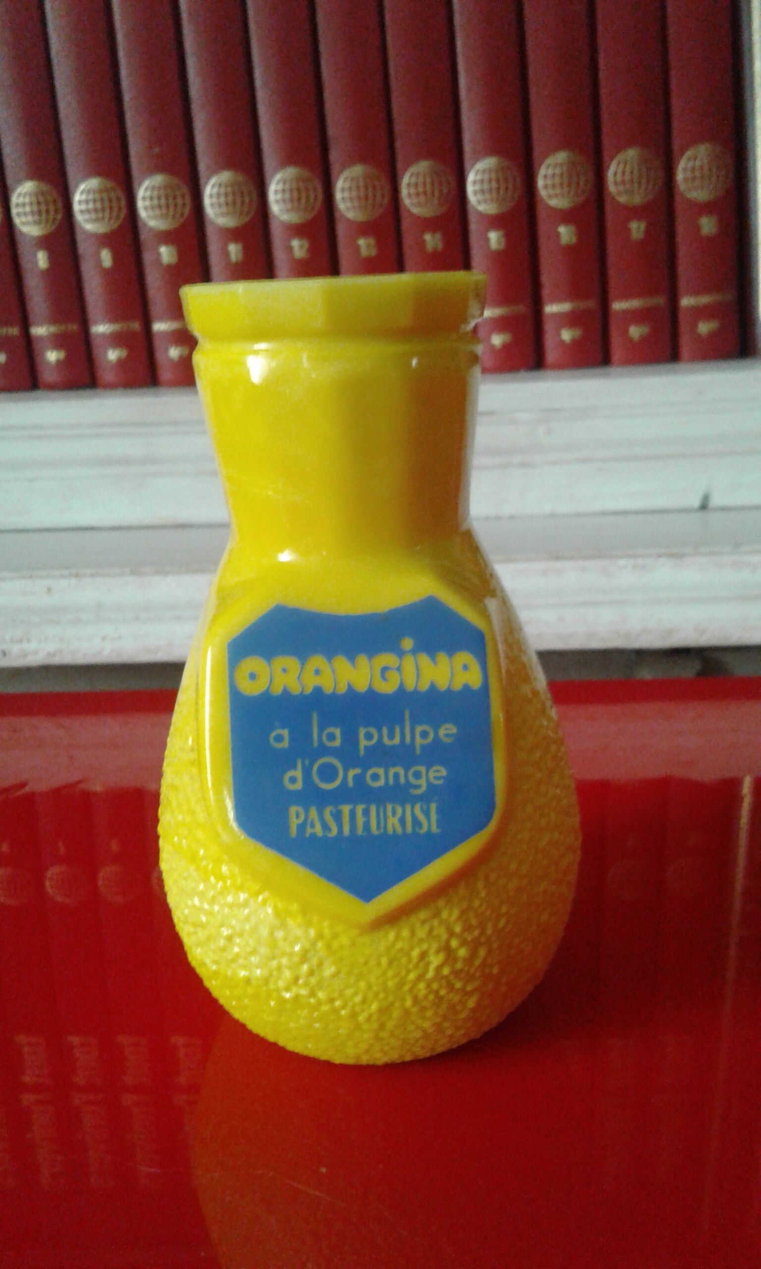 Vintage orangina straw holder