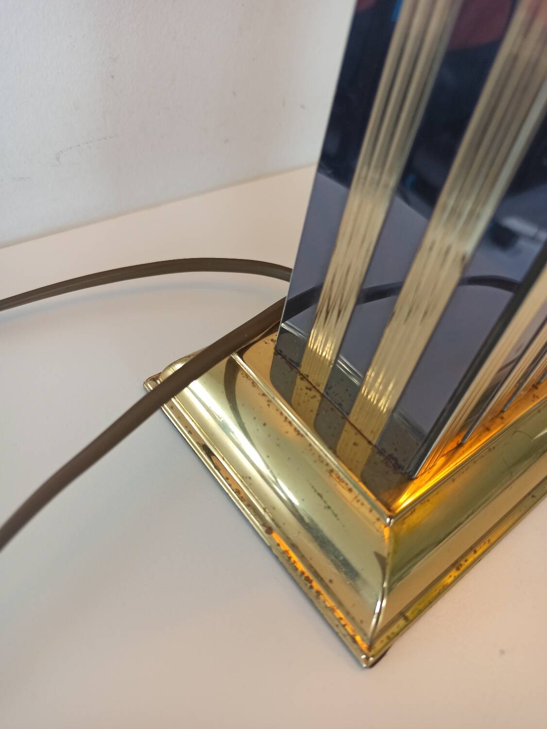 Pair of black and gold art deco style lamps