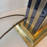 Pair of black and gold art deco style lamps