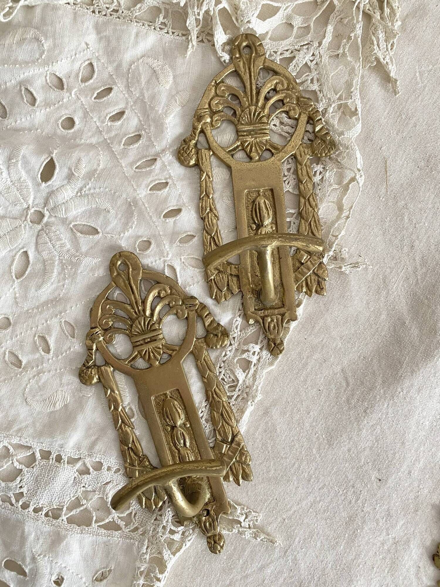 Brass coat hooks in the Napoleon III style.