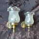Pair of wall sconces in bronze with opaline glass tulips.