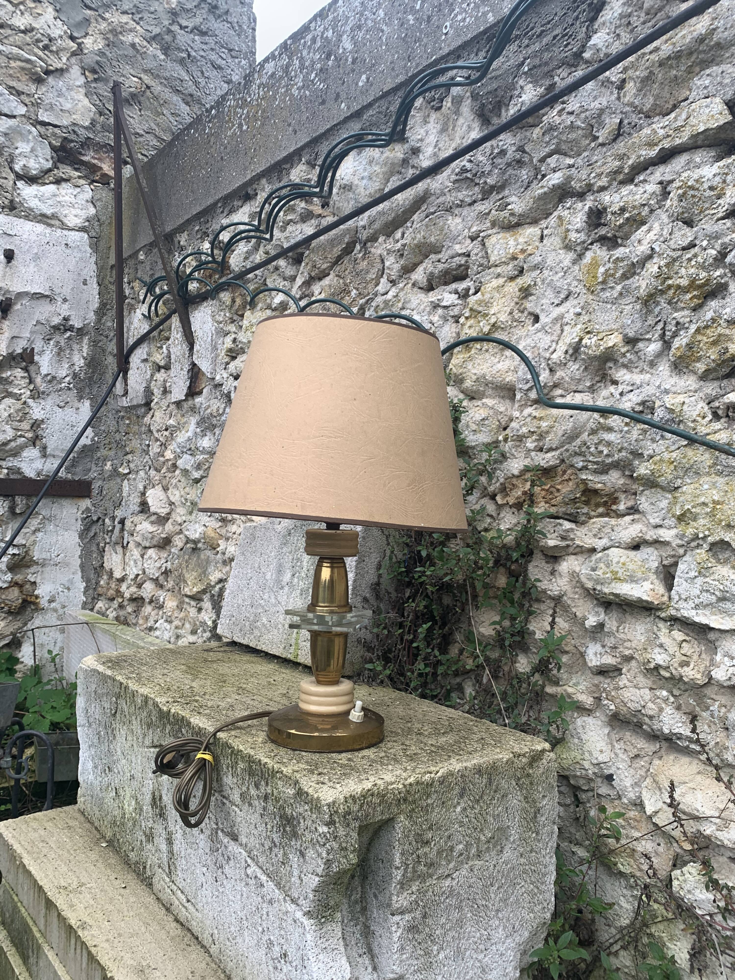 Table lamp in gilded metal, bakelite and antique plexiglass