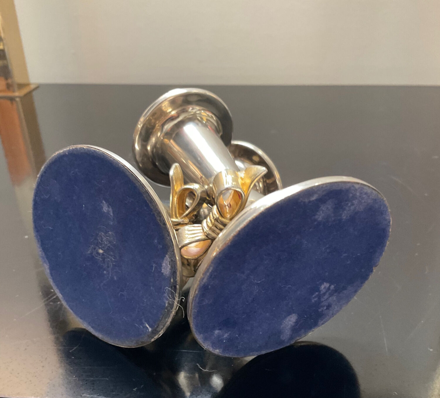 Pair of vintage candle holders in silver metal and brass