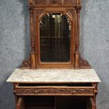 Buffet with mirror in Renaissance style, entirely made of solid walnut.
