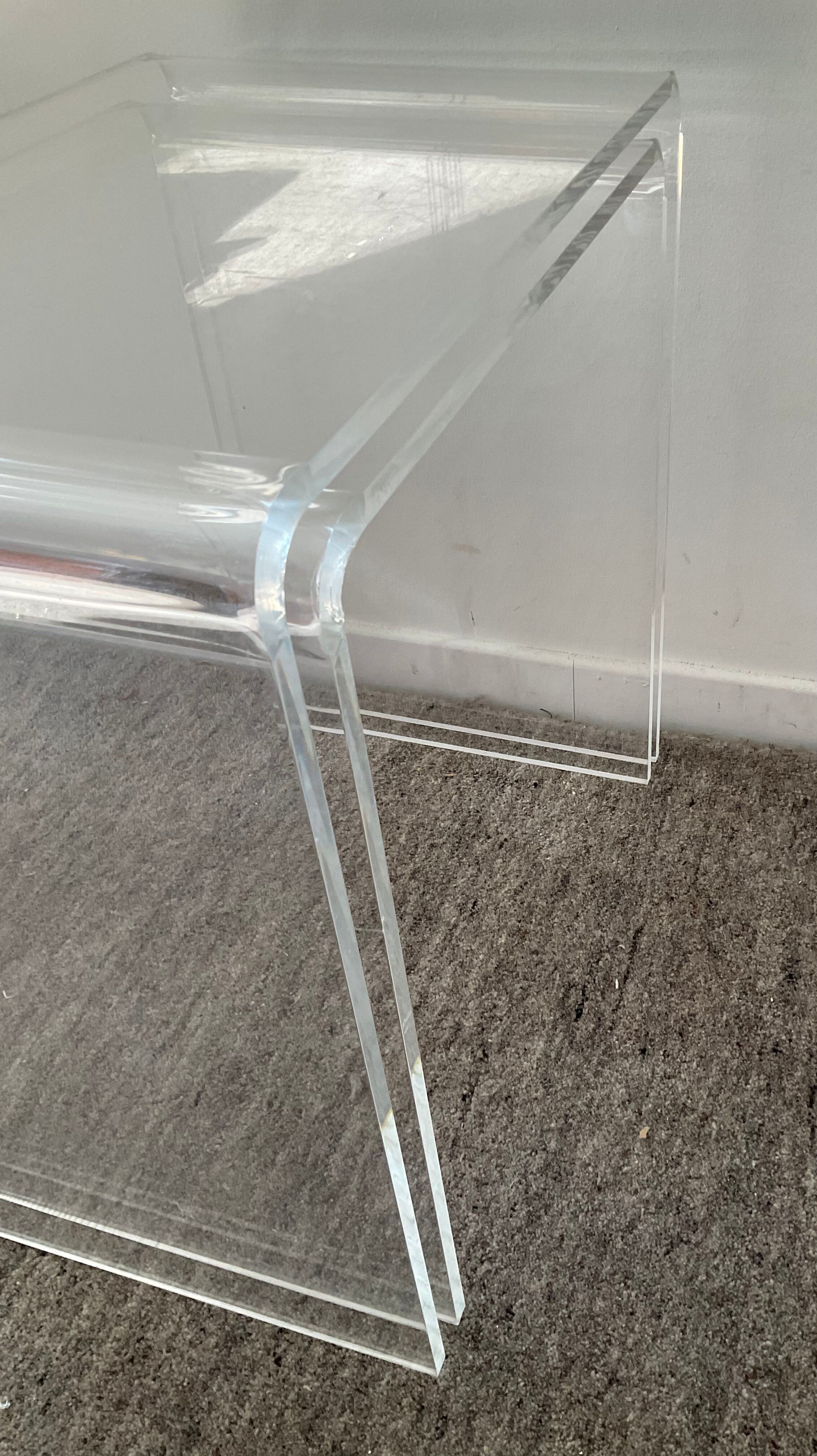 Duo of pull-out tables in plexiglass 70s