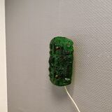 Old wall lamp made of hard pressed green glass.