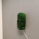 Old wall lamp made of hard pressed green glass.