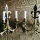 Paire d’appliques fleurs de lys bronze 3 lumières