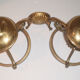 Glass brass globe sconce