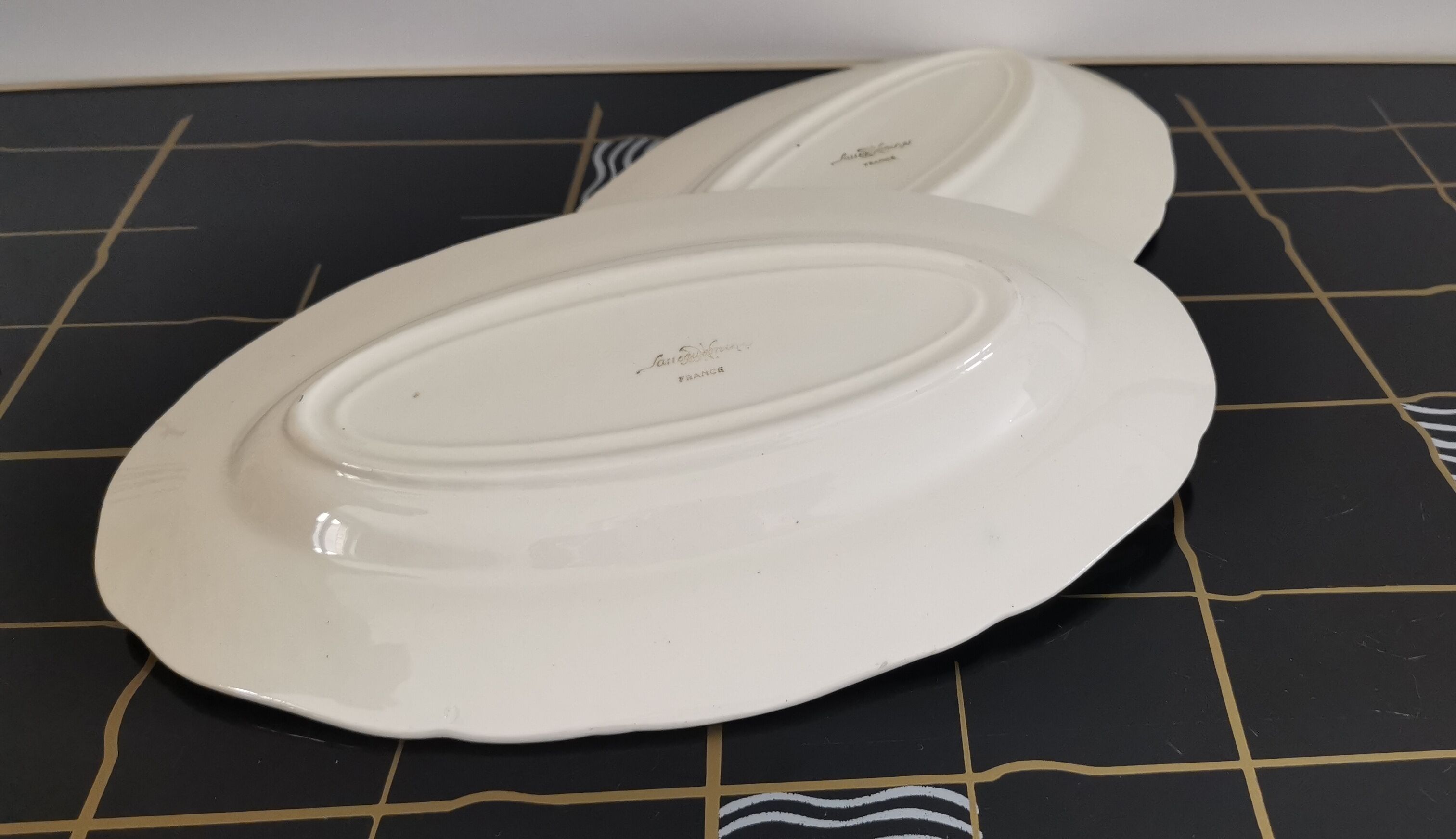 2 oval raviers Sarreguemines solid ivory color