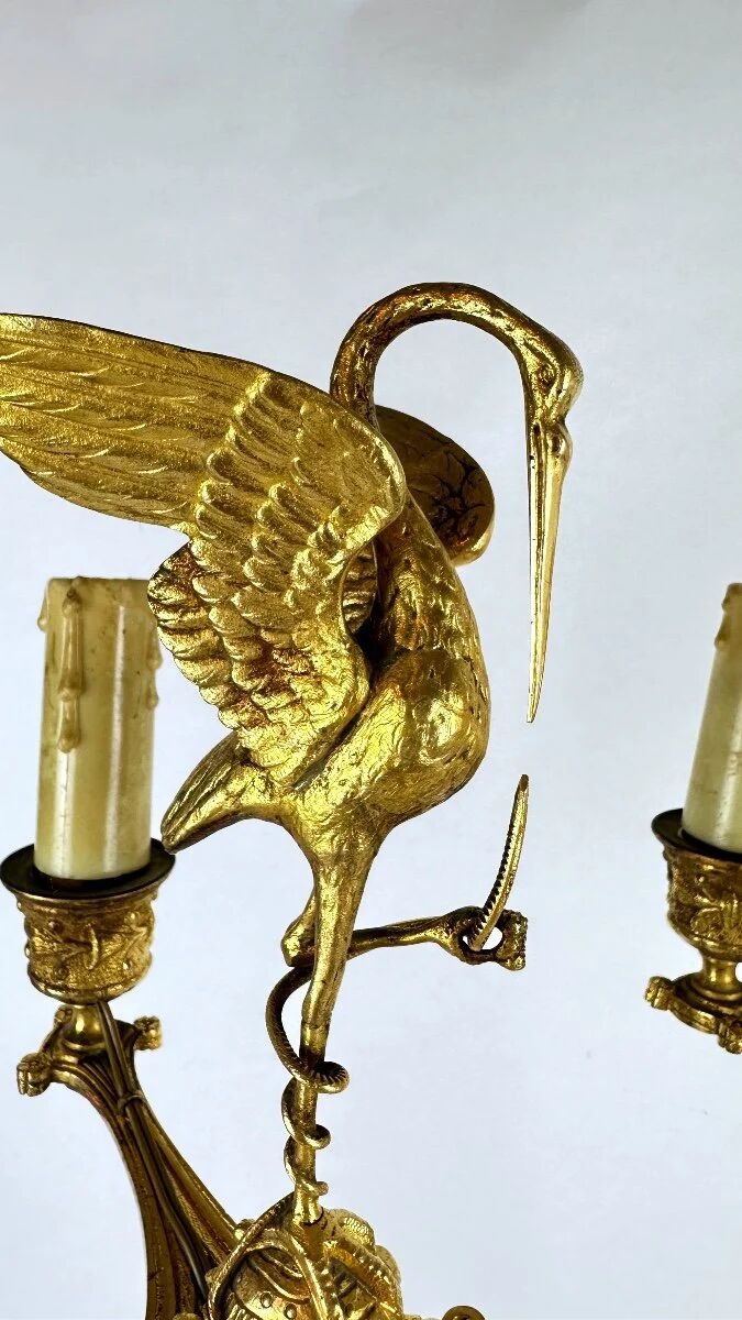 Pair of candelabra with a crane in gilded bronze, bamboo model.