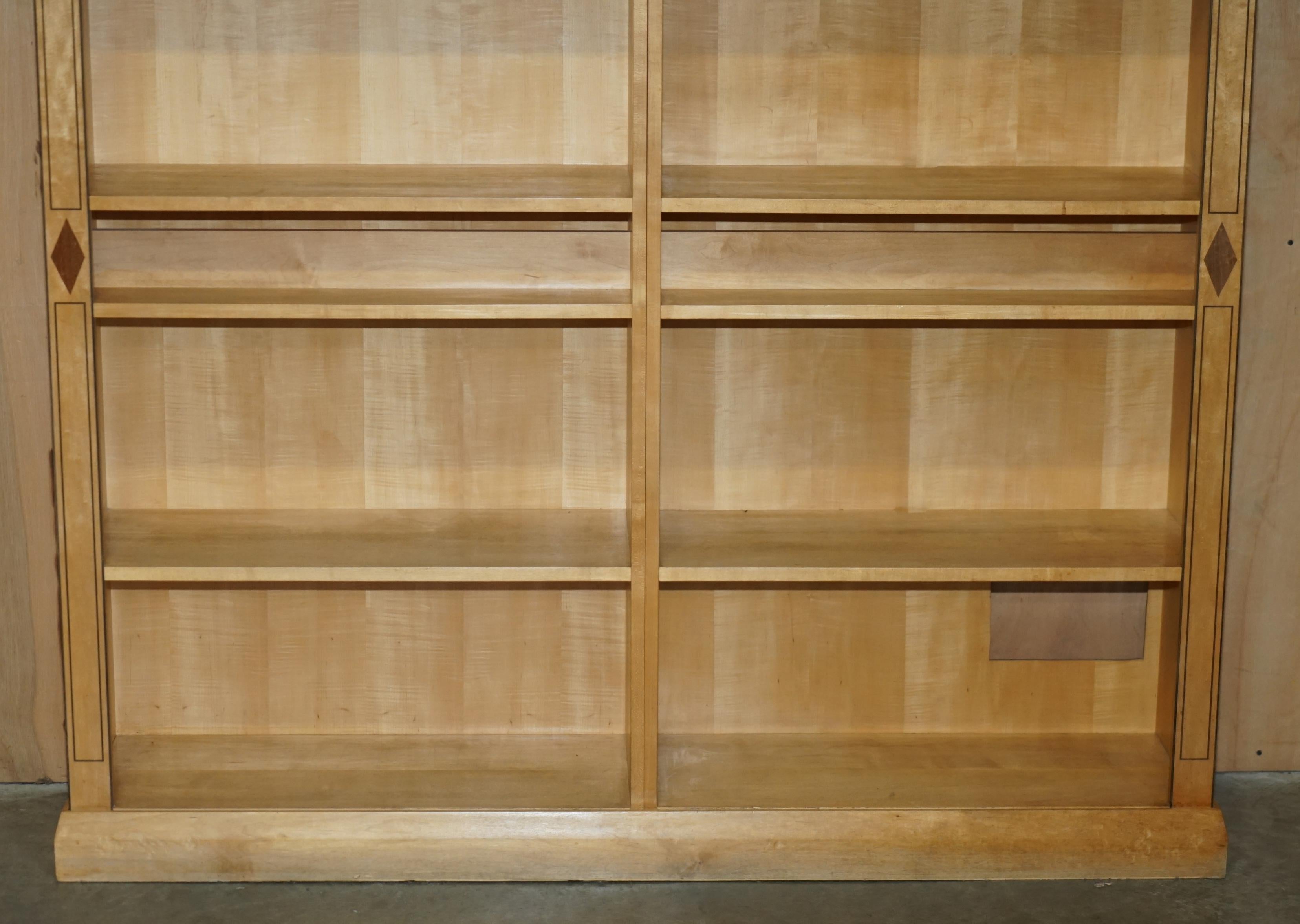 Pair of large open bookshelves in satin birch and walnut, height 2.5 m.