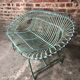 Green patinated iron garden bench