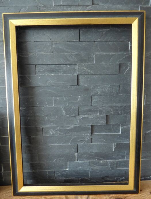 Wooden frame of black and gold color 63x46 cm