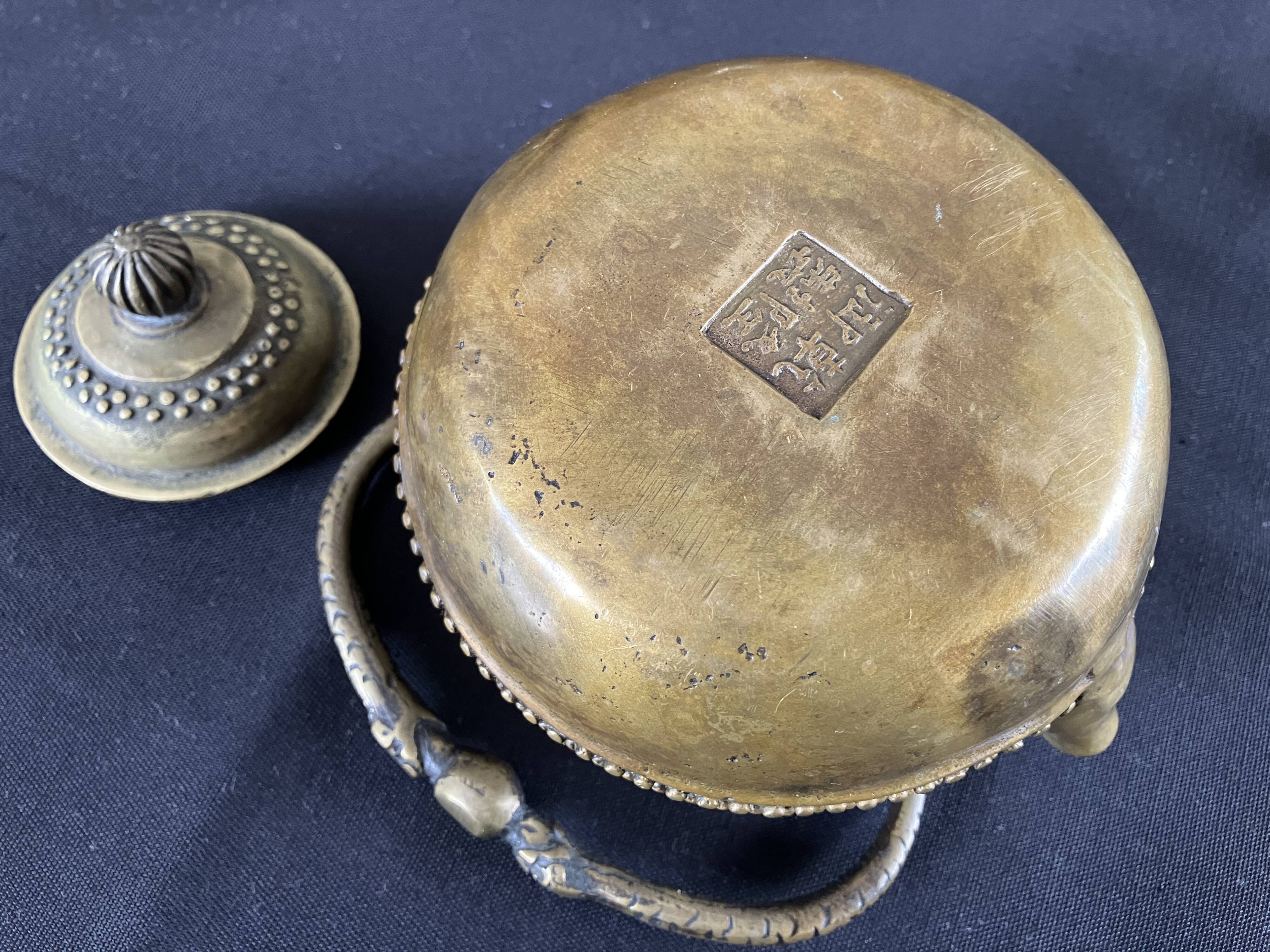 Chinese teapot in brass