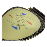 Triangular coffee table with vintage glass top