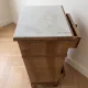 Antique bedside table in solid wood with a marble top.