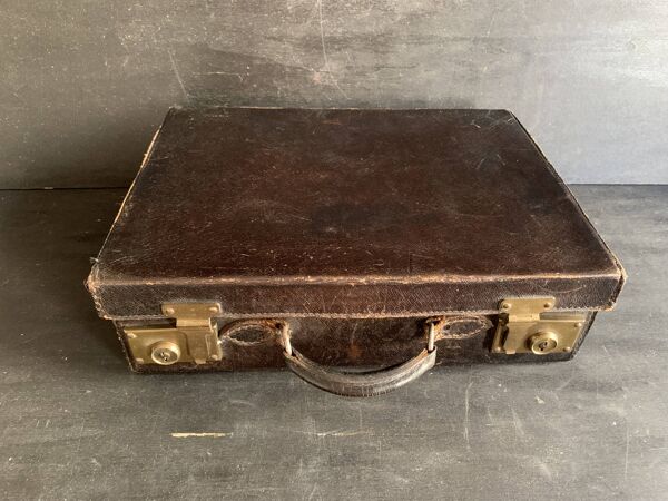 Valise de voyage en cuir grainé noir, années 1920