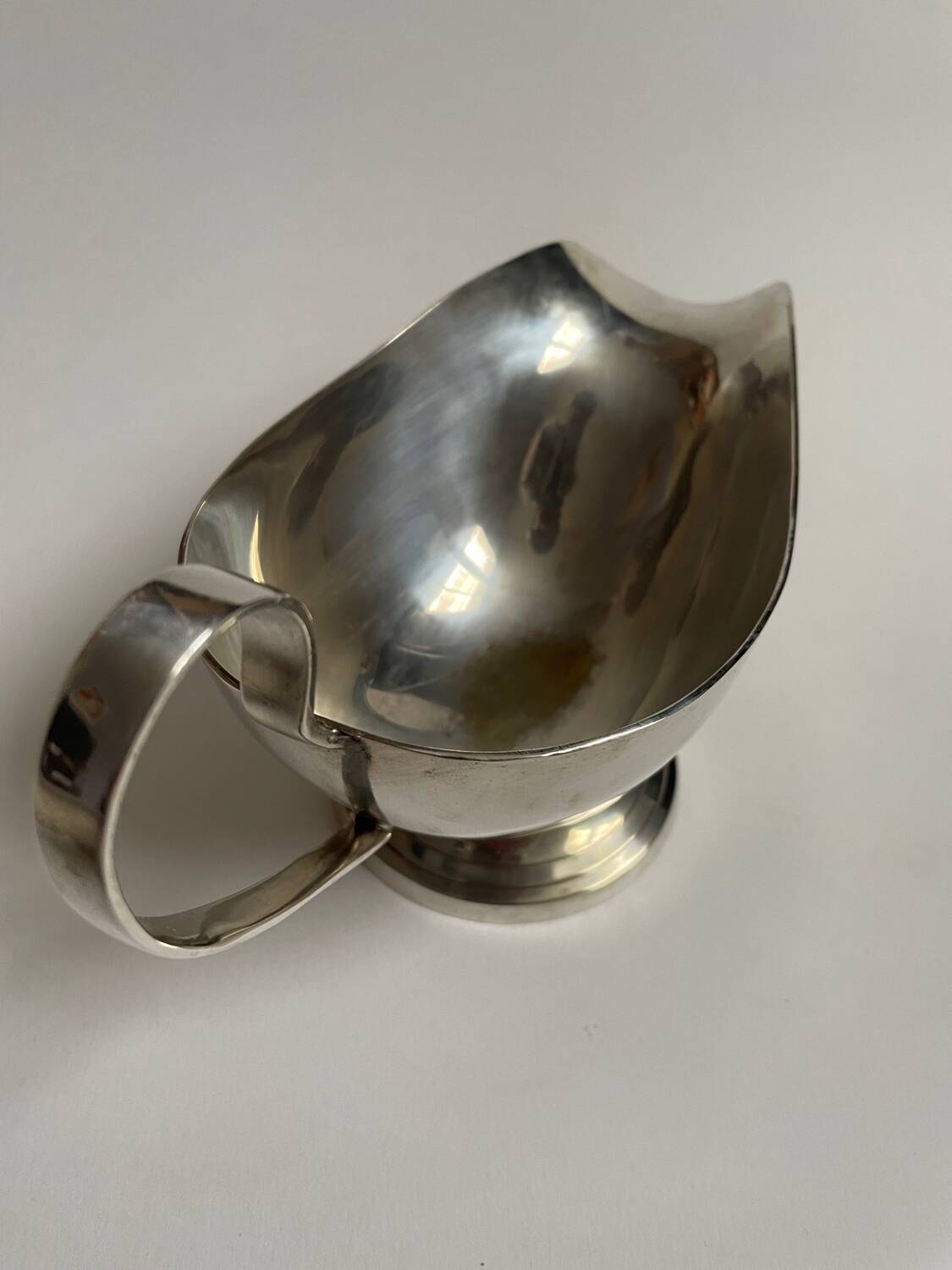 Silver metal sauce boat
