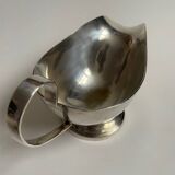Silver metal sauce boat