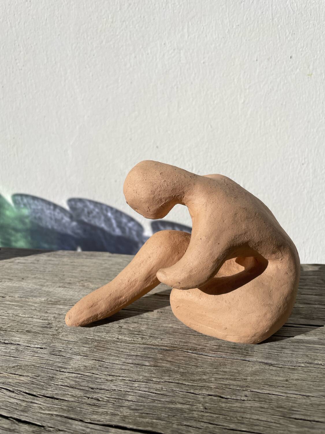 Terracotta sculpture figurine of a woman