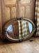Miroir doré ovale