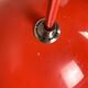 Red flowerpot hanging lamp by Verner Panton