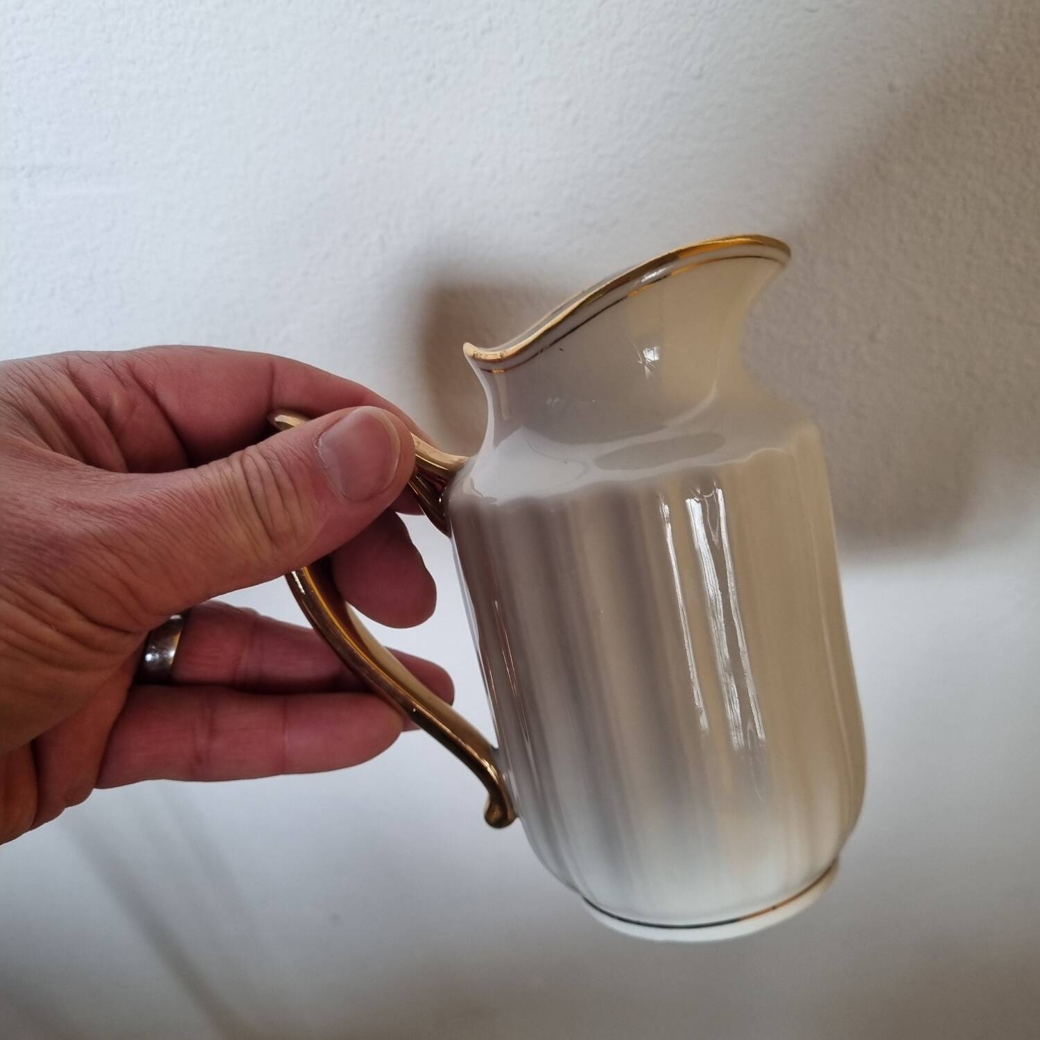 White and gold porcelain milk jug