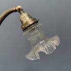 French art nouveau table lamp with transparent glass shade