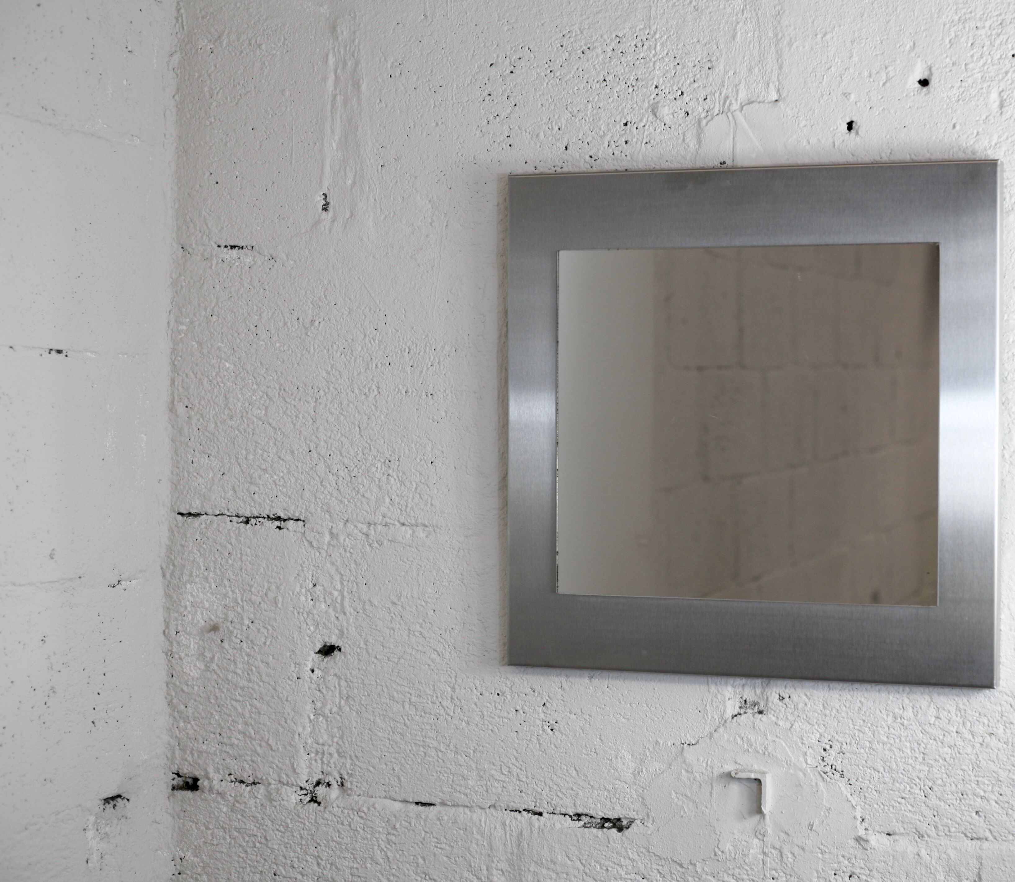 Mirror "space age". Stainless steel. France, circa 1970