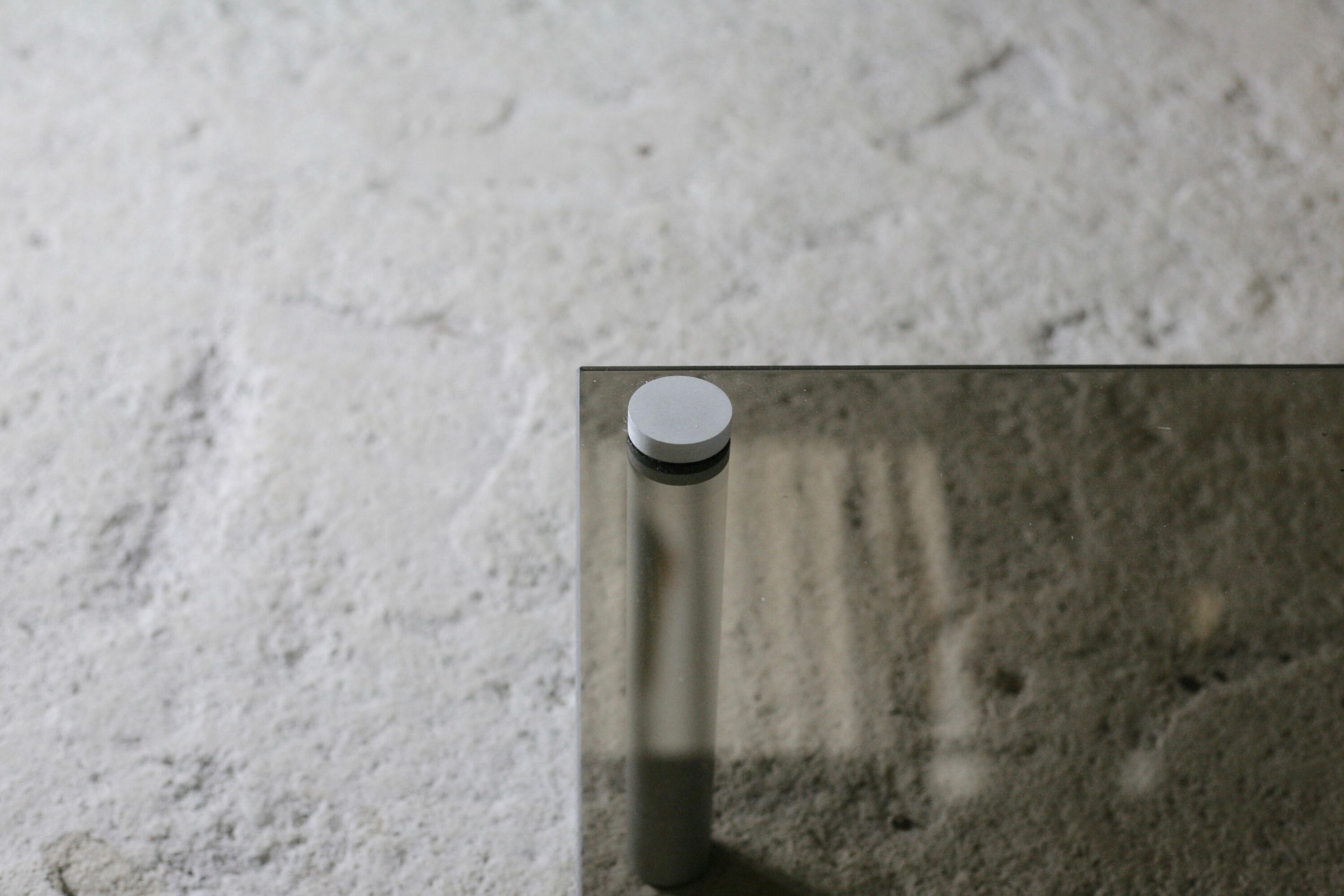 Coffee table cylindrical footings, tray smoked glass, circa 1970