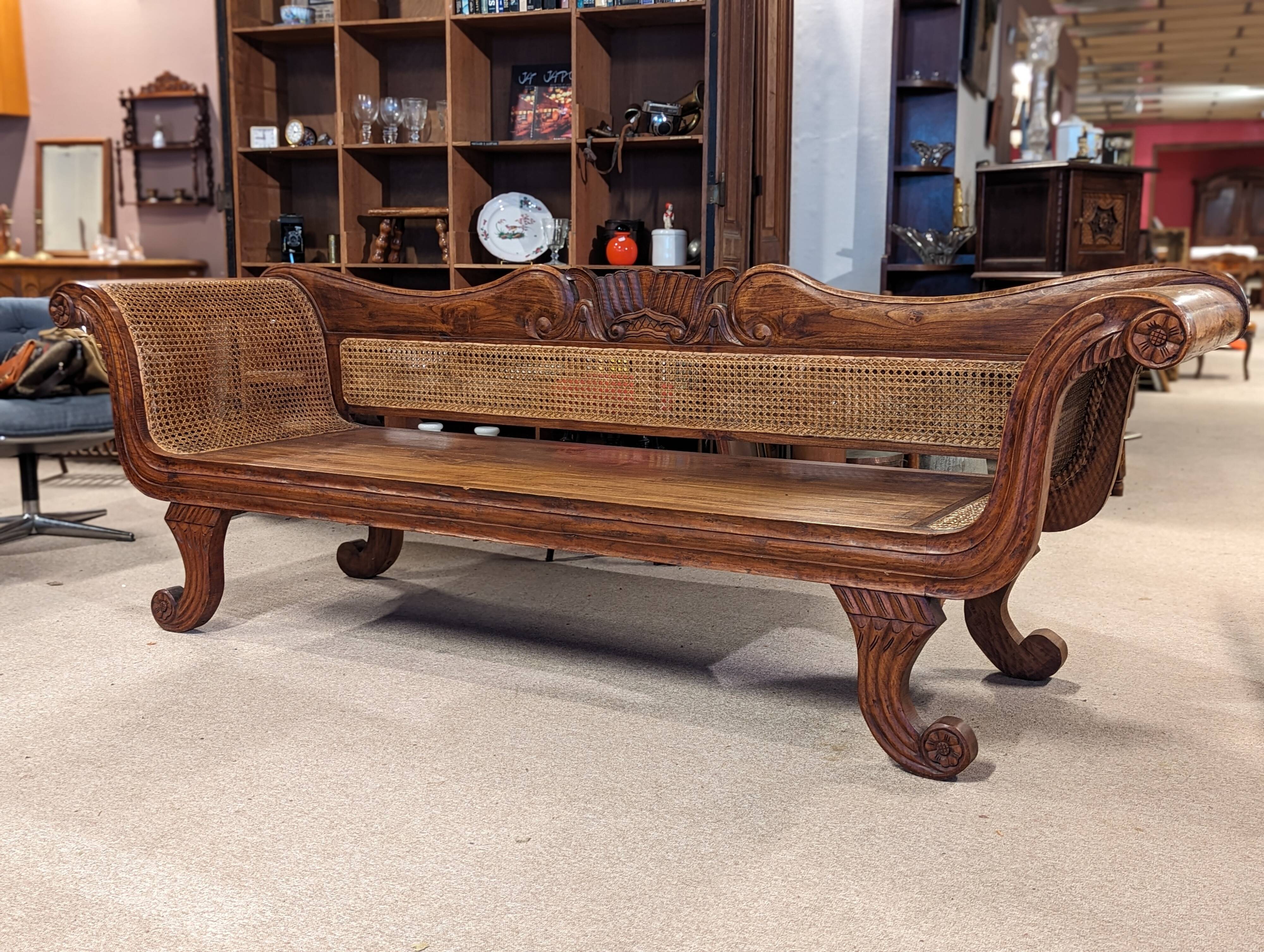 Large colonial caned bench