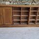Oak workshop furniture with sliding doors.