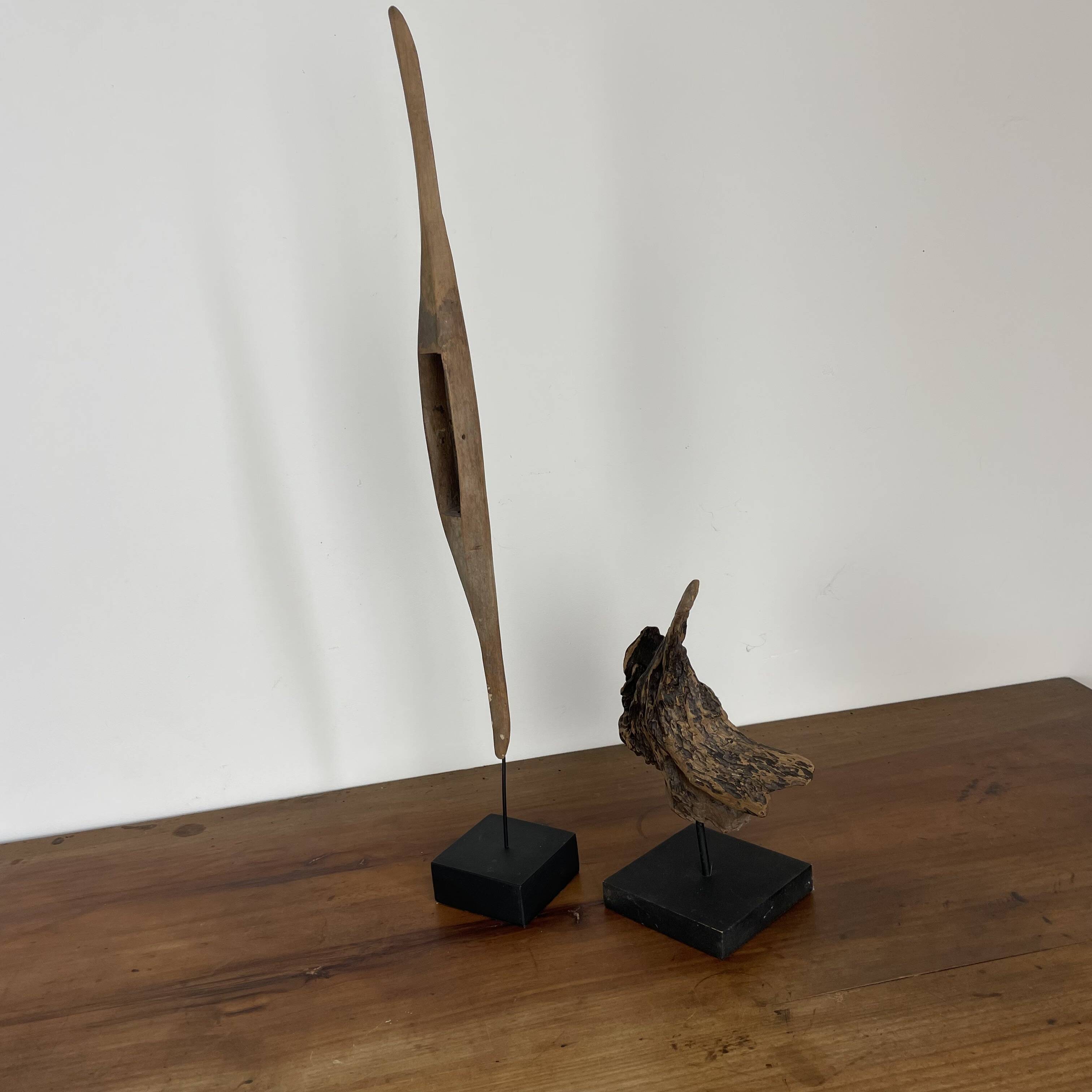 Set of 2 wooden sculptures on base