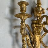 Pair of Louis XVI style wall sconces in gilded bronze, circa 1880.