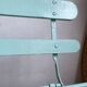 Former folding garden bench with wooden and metal slats