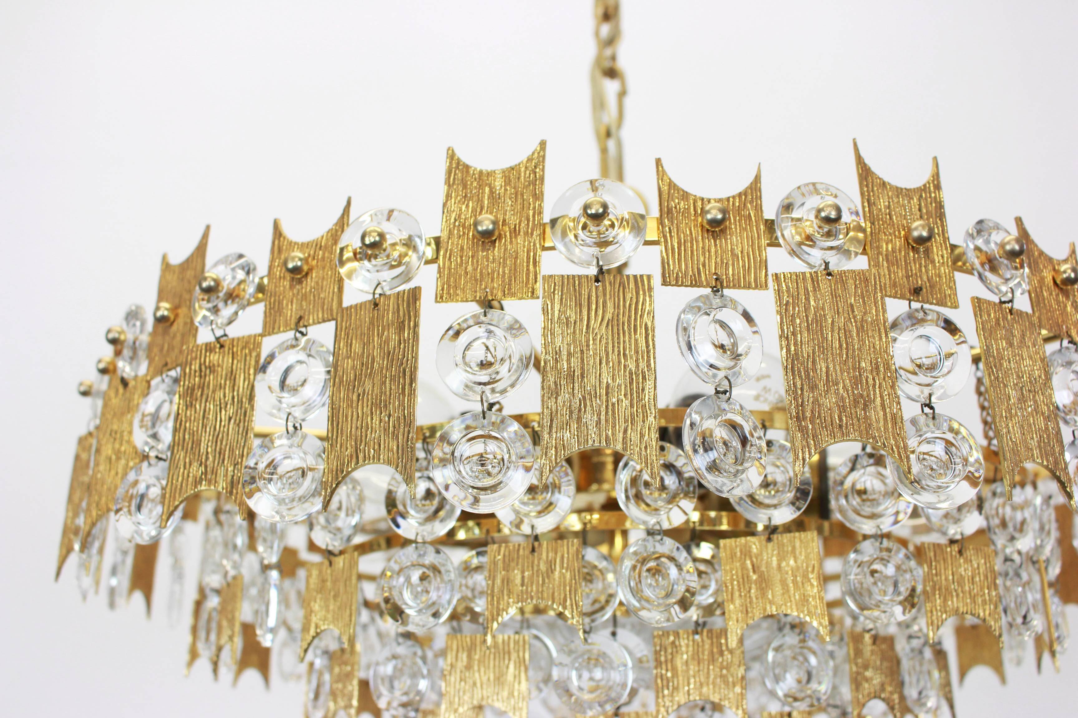 Impressive large chandelier in gilded brass and crystal glass by Palwa Germany, 1960s.