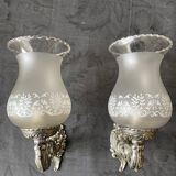 Pair of frosted glass globe wall lights from the early 20th century