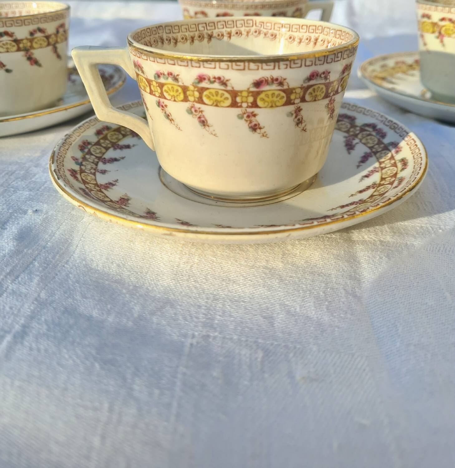 Gien opaque porcelain cups from the early 20th century