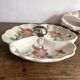 Art Nouveau slip dish with poppy decoration